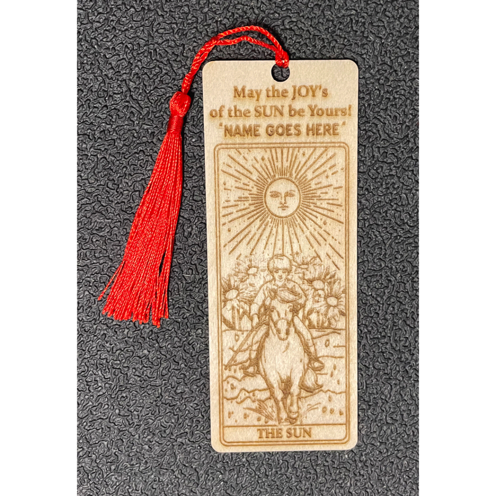 One of a kind, TAROT The SUN Bookmark. We see the child, joyfully riding his horse, the sunflowers etch the background, and the sun is smiling above.