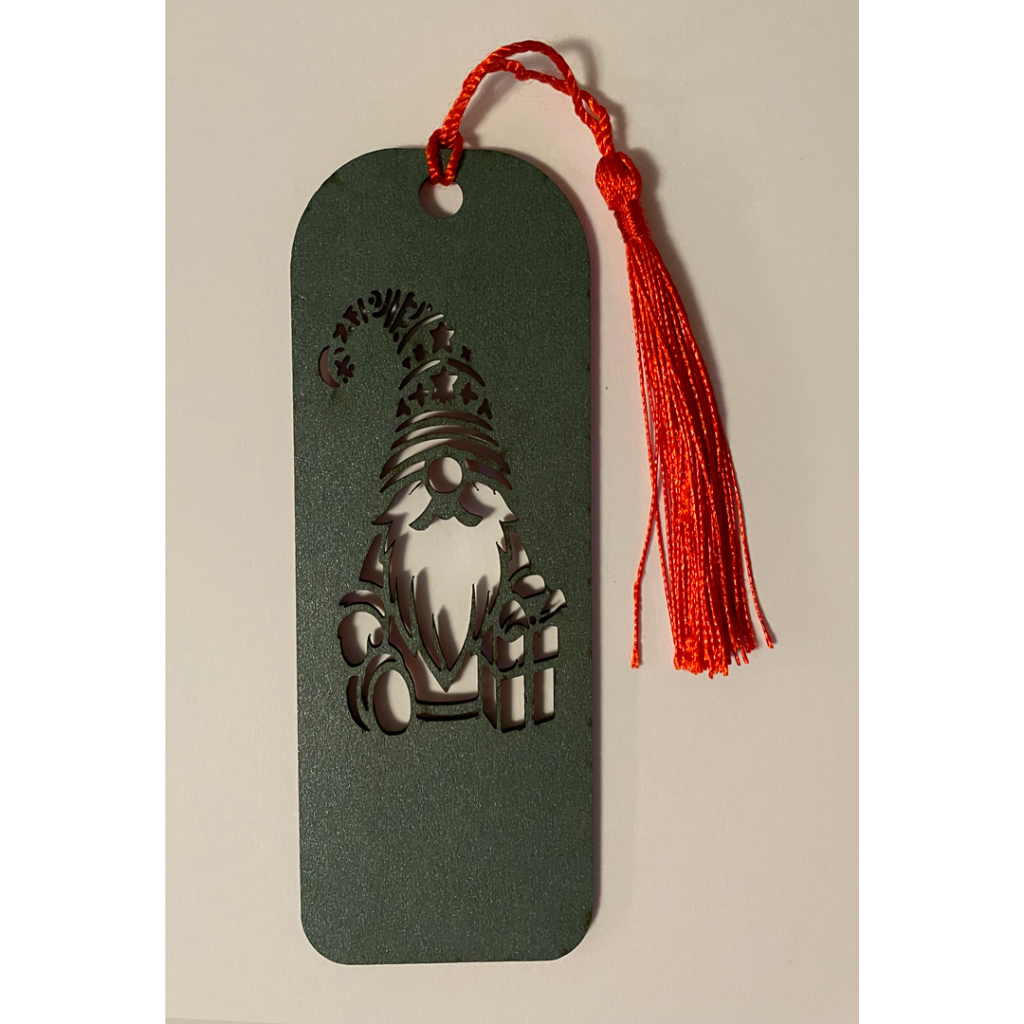 We have a double-sided bookmark with a wonderful Gnome and its Christmas presents - one side is green and the other side is red.