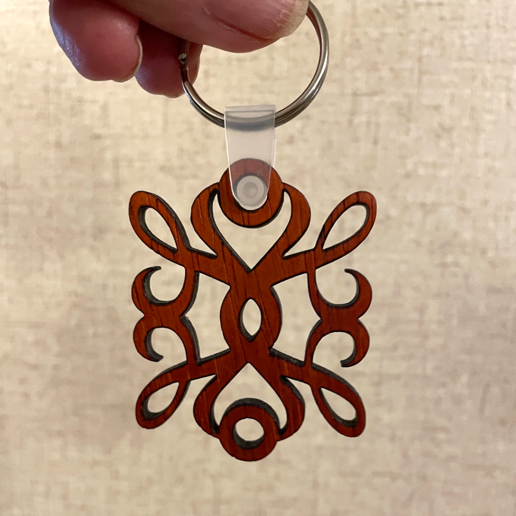 Keychain lasered out of the Exotic Padauk Hardwood.